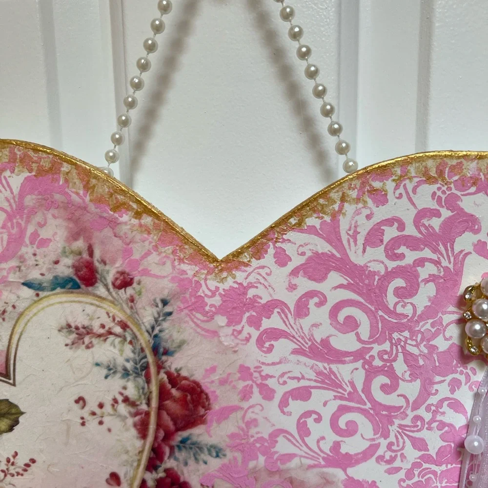 Elegant Pink Heart Wreath with Red Floral Design